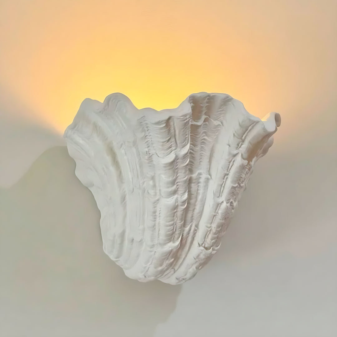 Wandleuchte aus Muschelputz