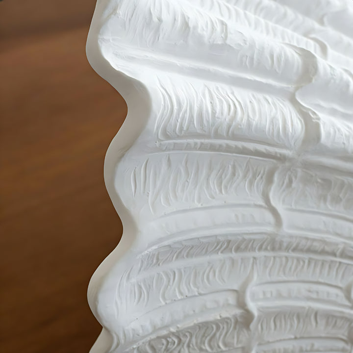 Wandleuchte aus Muschelputz