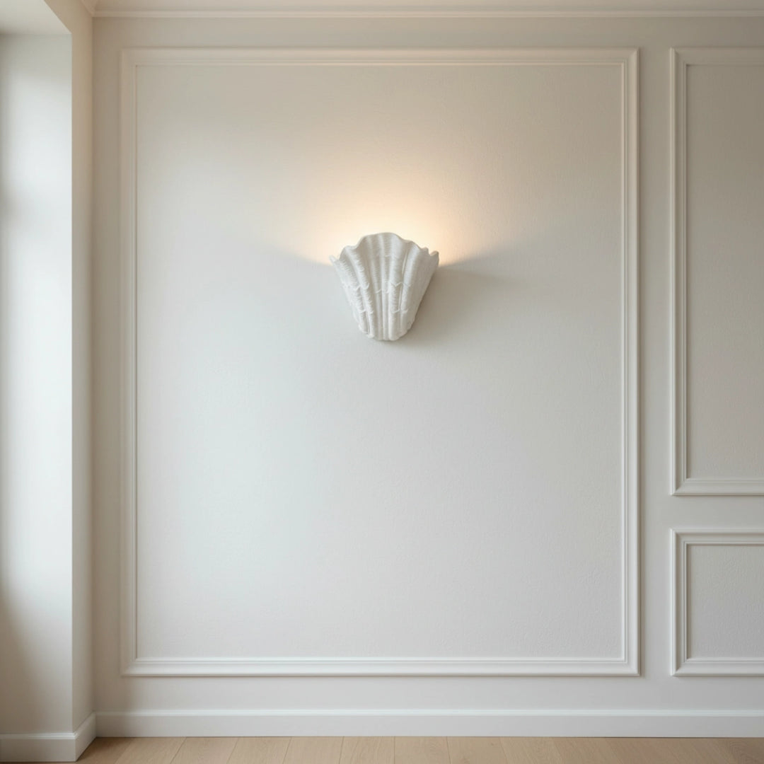 Wandleuchte aus Muschelputz