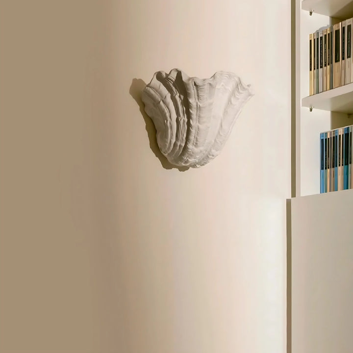 Wandleuchte aus Muschelputz