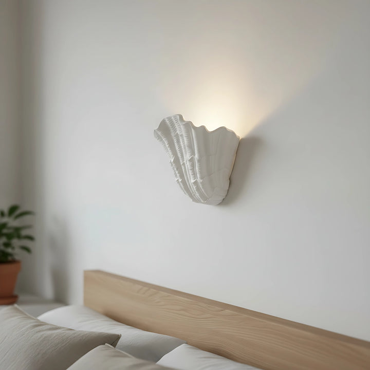 Wandleuchte aus Muschelputz