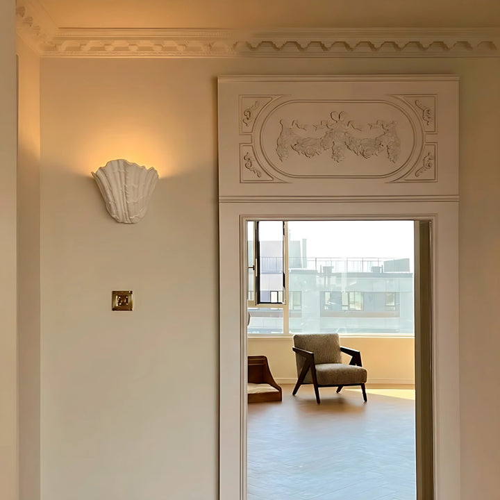 Wandleuchte aus Muschelputz