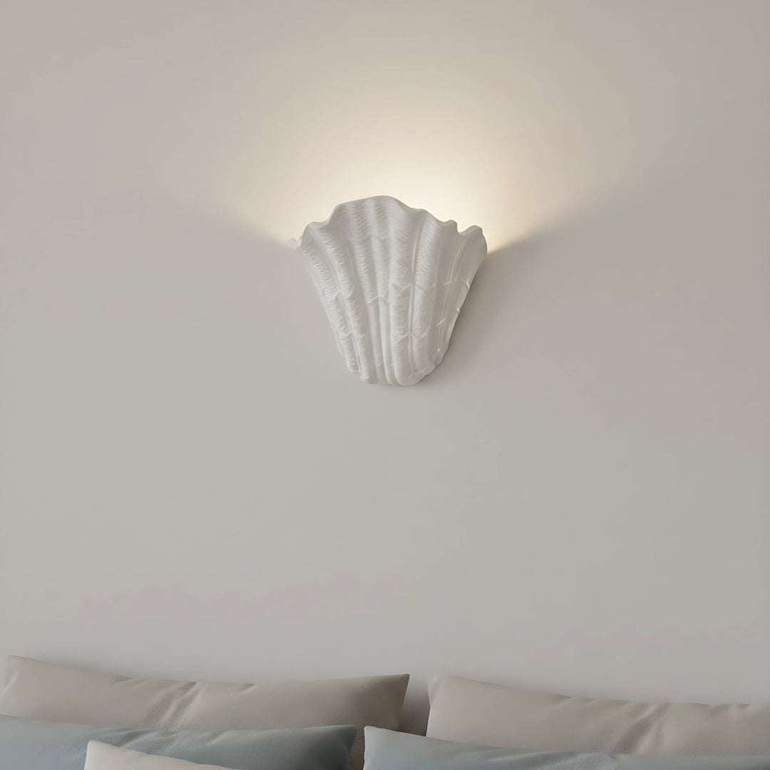 Wandleuchte aus Muschelputz